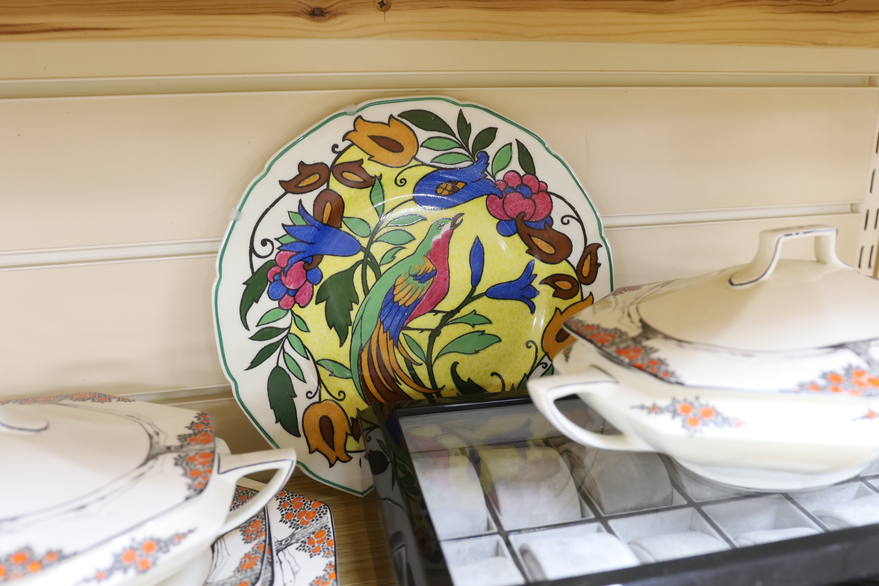 A Crown Ducal orange tree pattern part dinner set including tureens, side plates and jug, together with a Royal Doulton plate, largest 32cm wide